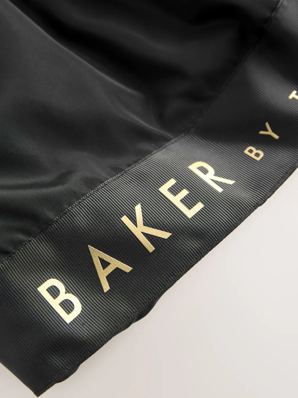 Baker by Ted Baker Shower Resistant Branded Hem Raincoat