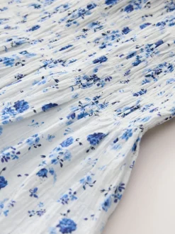 Blue Floral Smocked Frill Sleeve Dress (3-16yrs)