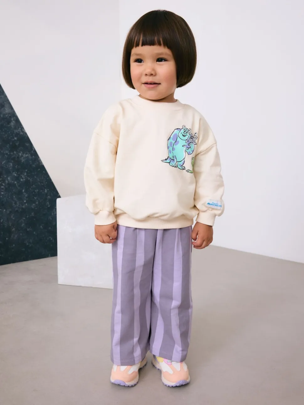 Ecru White Monsters, Inc Long Sleeve Top and Barrel Leg Trousers (3mths-7yrs)