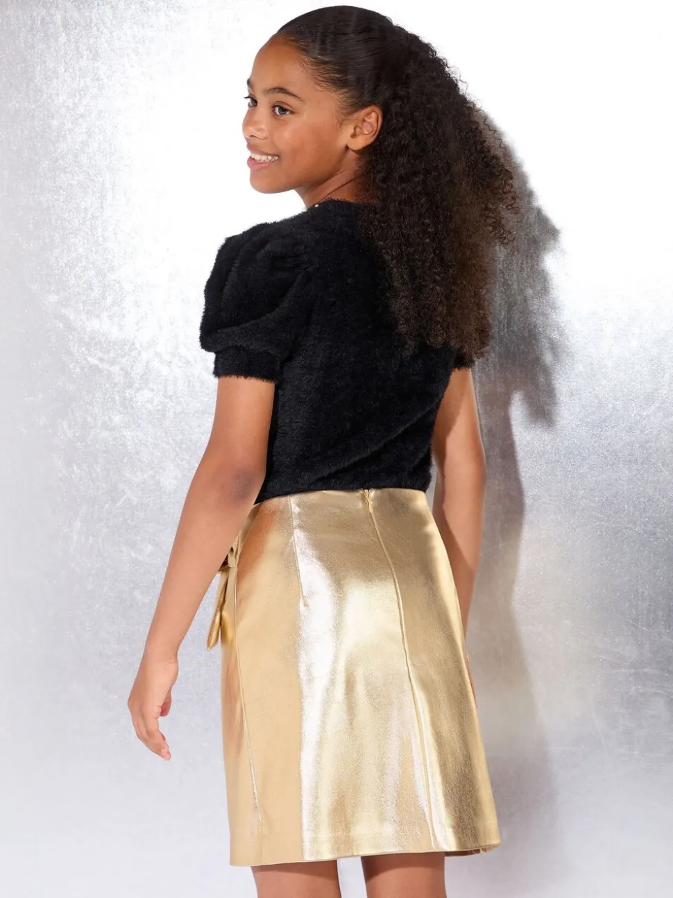 Lipsy Gold PU Bow Skirt (9-16yrs)