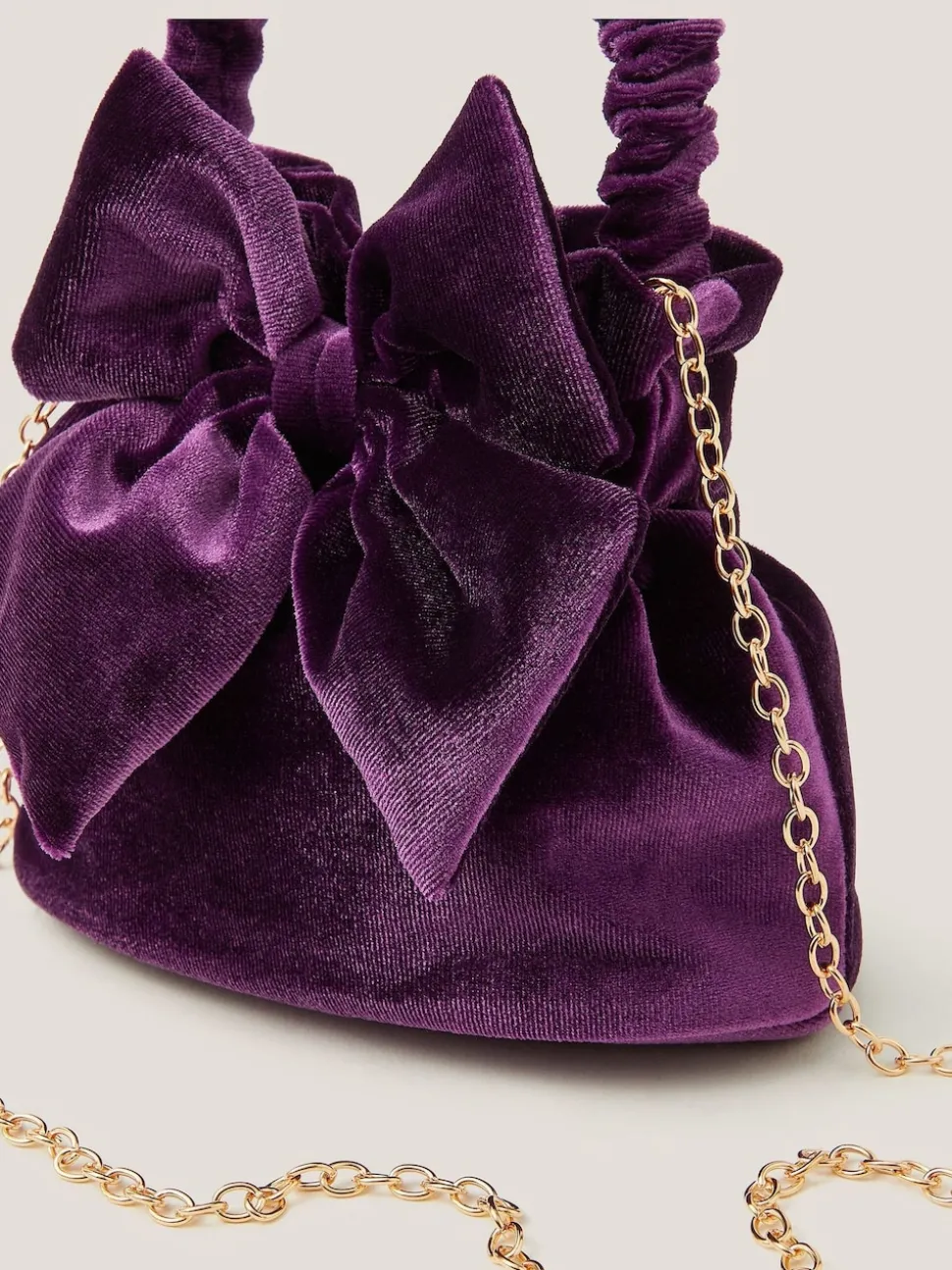 Monsoon Purple Bow Velvet Pouch Bag