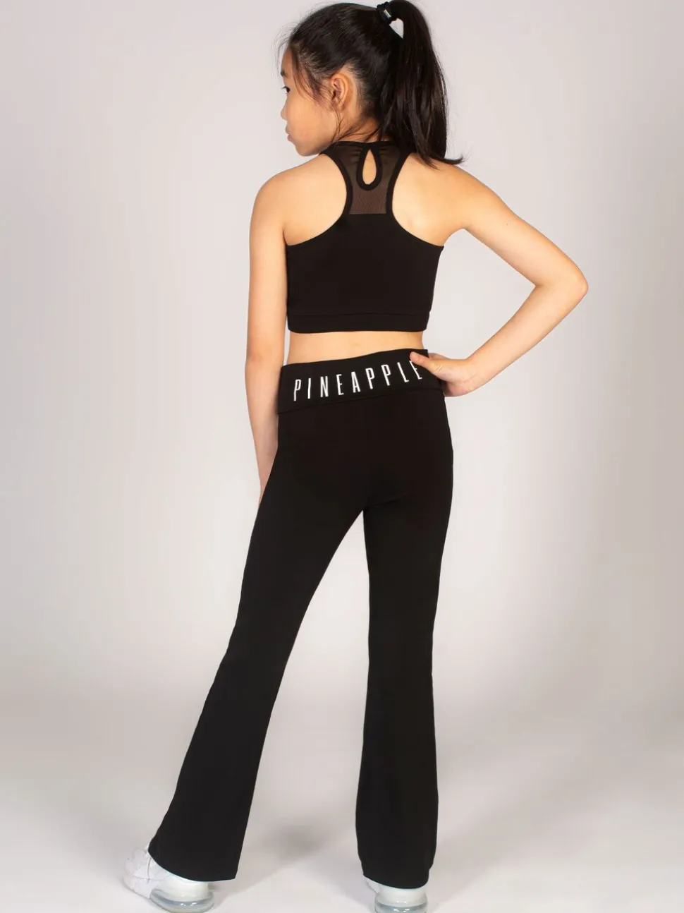 Pineapple Black Foldover Waistband Girls Jersey Flare Trousers