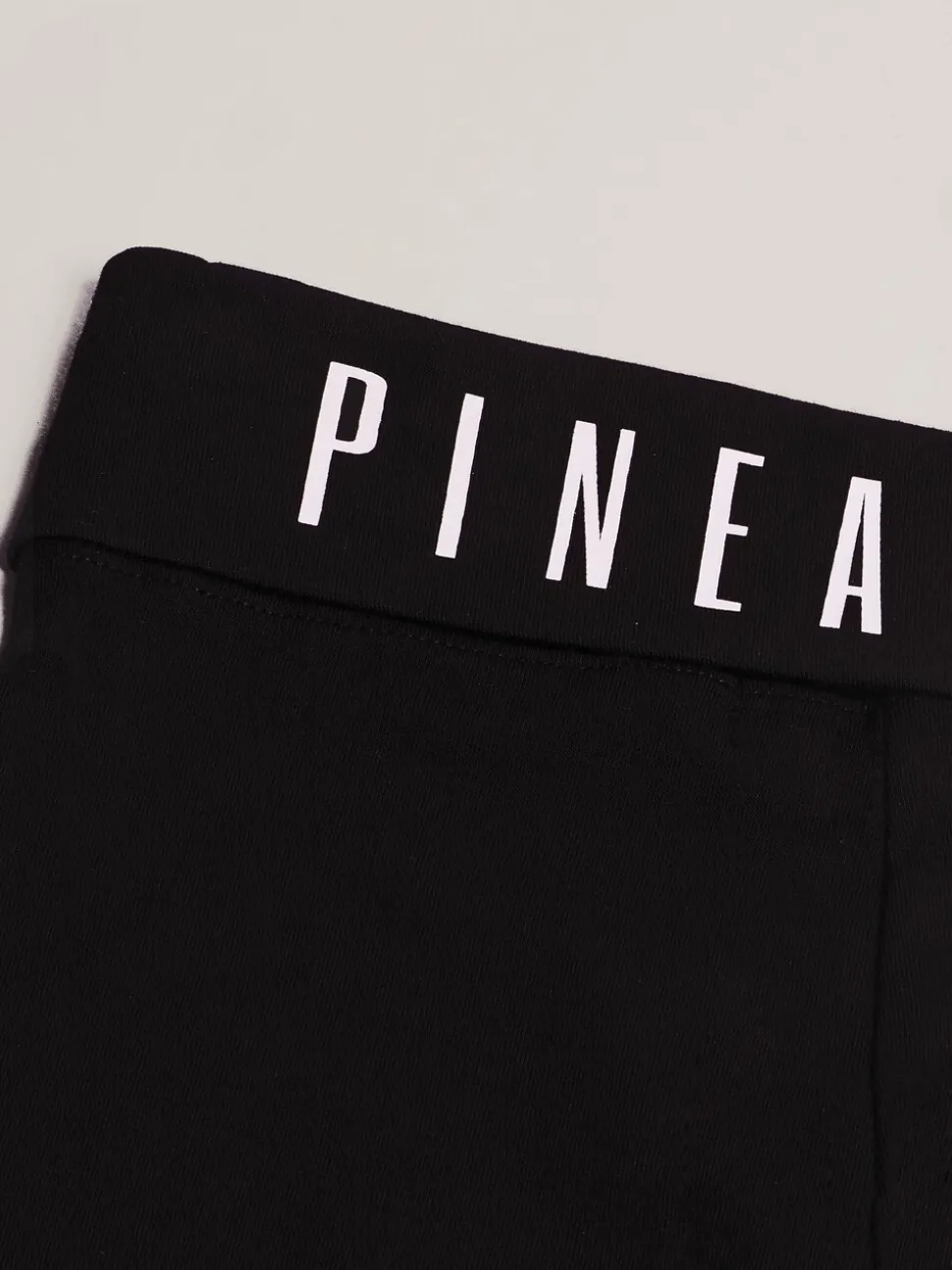 Pineapple Black Foldover Waistband Girls Jersey Flare Trousers