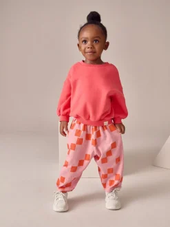 Pink Checkerboard Barrel Trousers (3mths-7yrs)