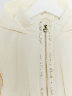 River Island Cream Girls Peplum Rain Coat