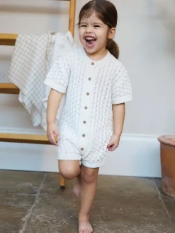 The Little Tailor Baby Scallop Design Pointelle Button Through 100% Cotton Romper