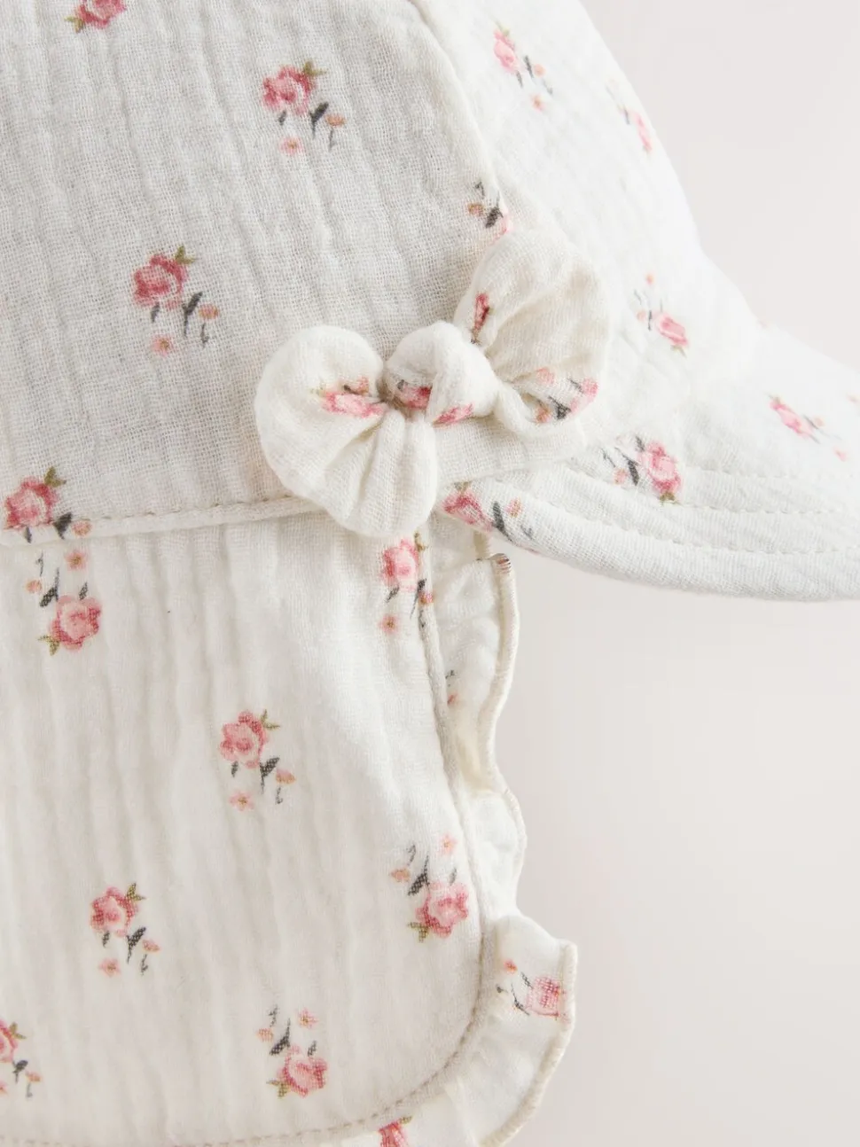 White Floral Woven Legionnaire Baby Hat (0mths-2yrs)