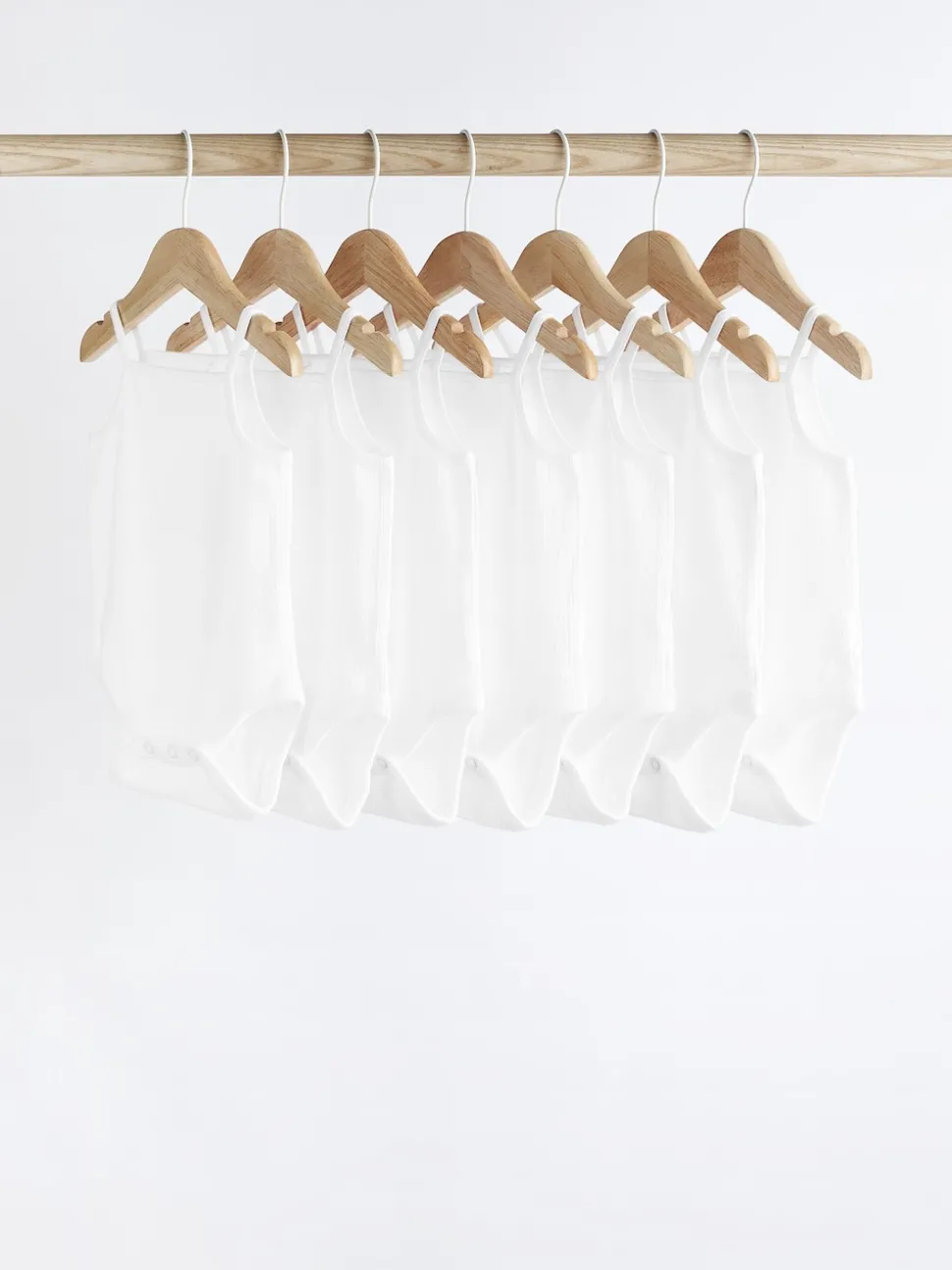 White 7 Pack Baby Strappy Bodysuits