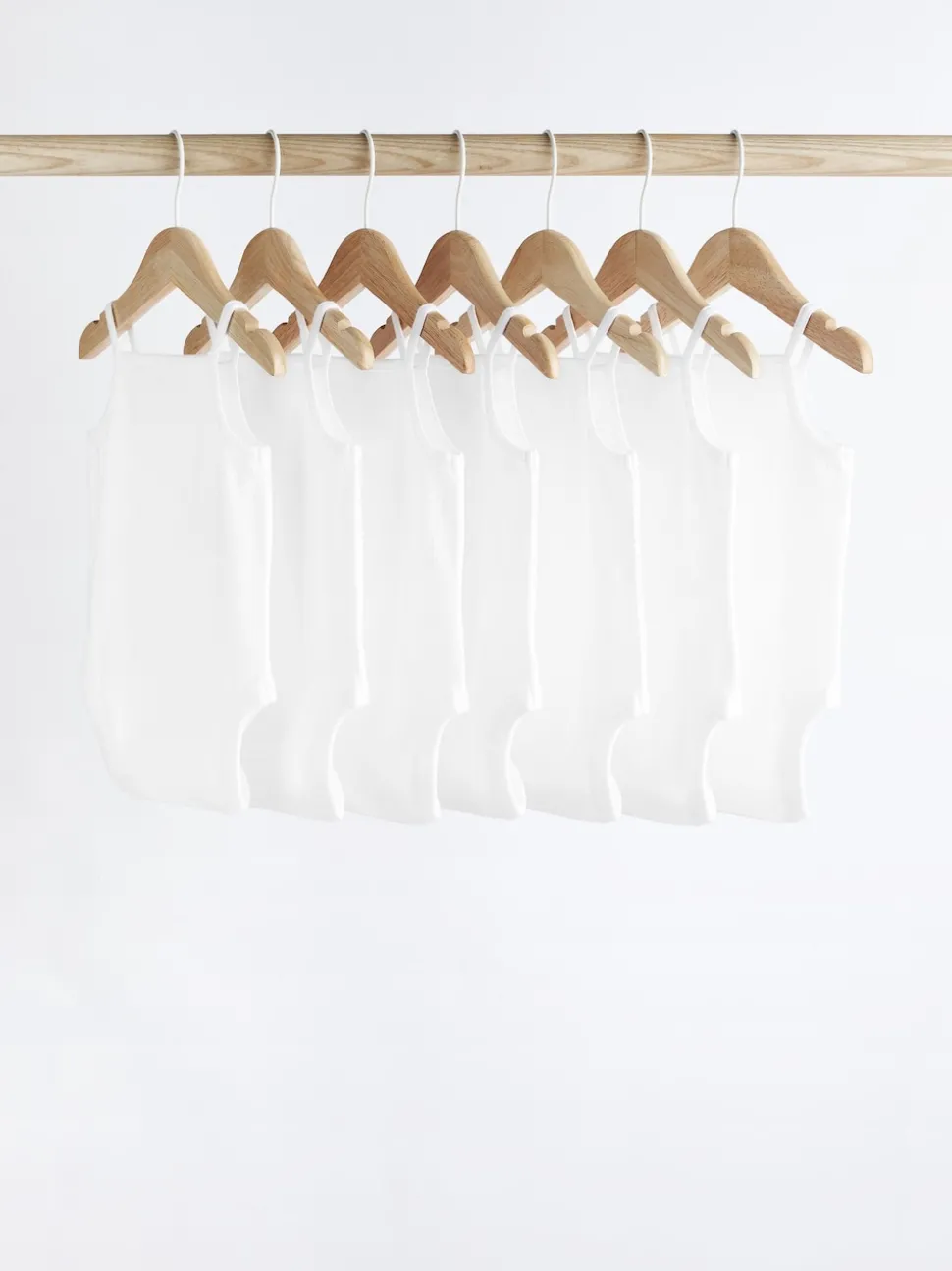 White 7 Pack Baby Strappy Bodysuits